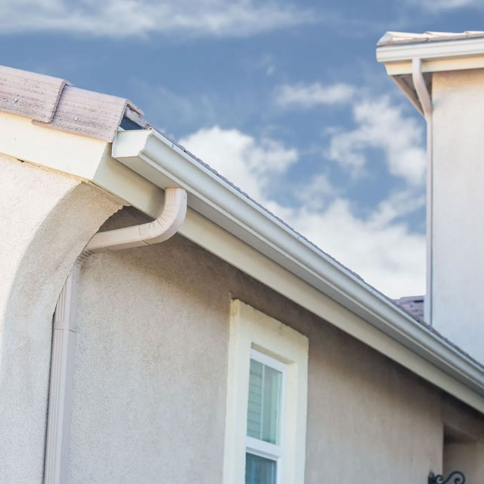 angled view of gutters and downspouts